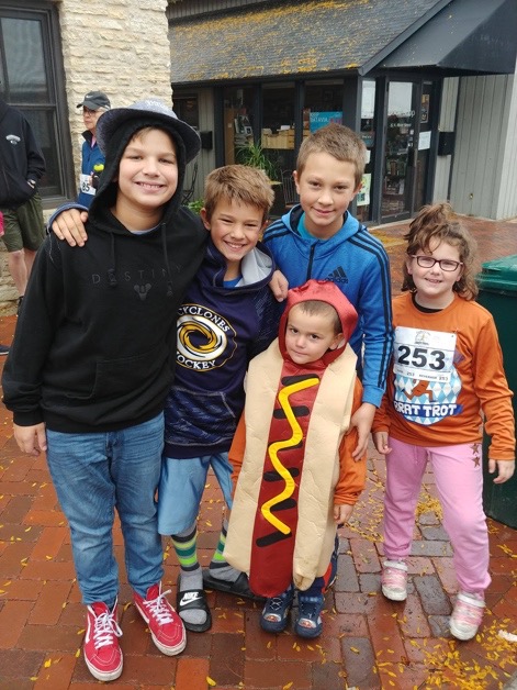 A group of people posing for the camera  Description automatically generated