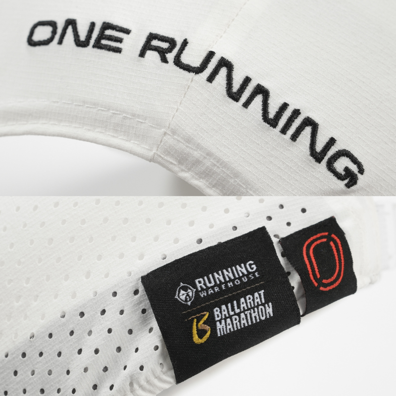 Details - white cap with black 'One Running' embroidery and One Running / Running Warehouse Ballarat Marathon label