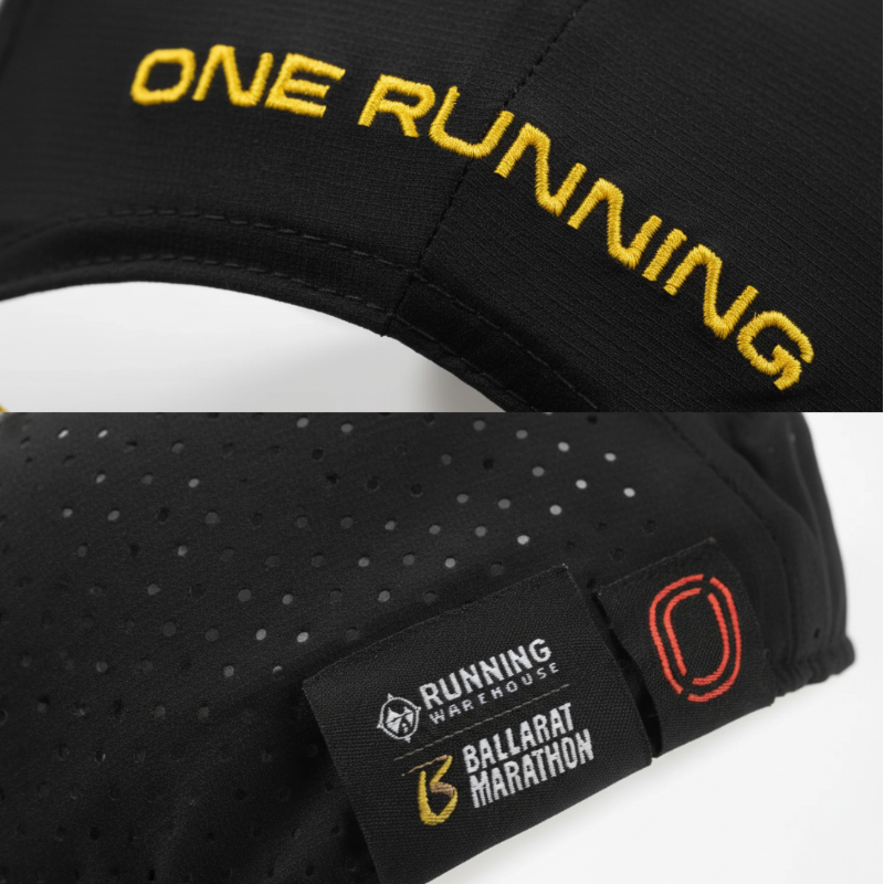 Details - black cap with yellow 'One Running' embroidery and One Running / Running Warehouse Ballarat Marathon label