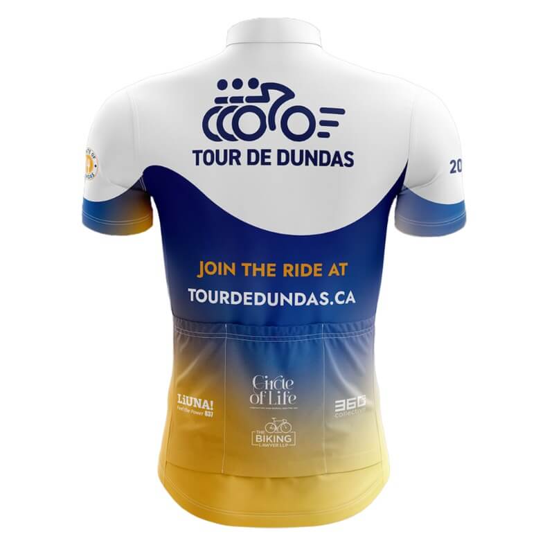 Back view of a cycling jersey with a large Tour de Dundas logo, there's a wave of blue, and there's orange text reading 'JOIN THE RIDE AT' then below in white, there's text saying 'TOURDEDUNDAS.CA' . The blue is transitioning to orange (gradient). On the 