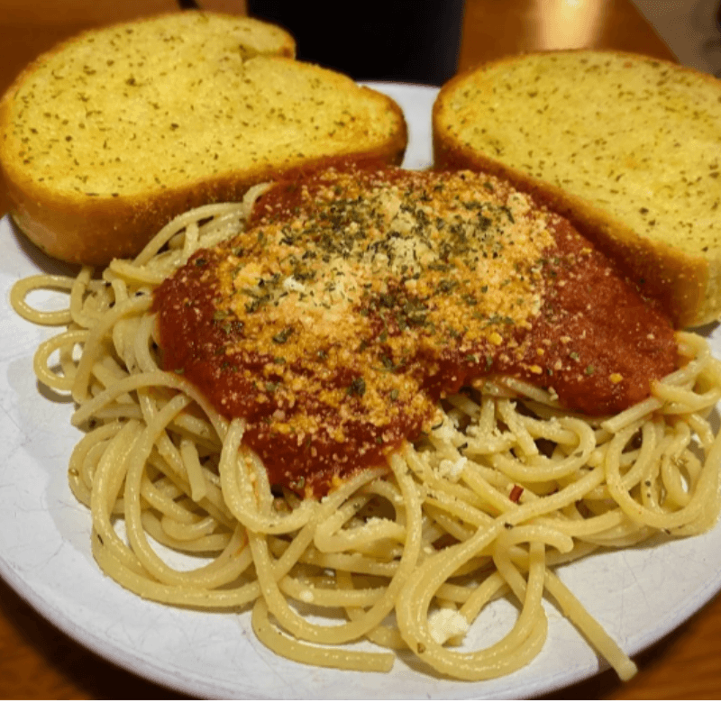 Picture of Carb Loading Dinner (pasta, sauce and garlic bread) hosted by the Travel Club on Campobello Island.