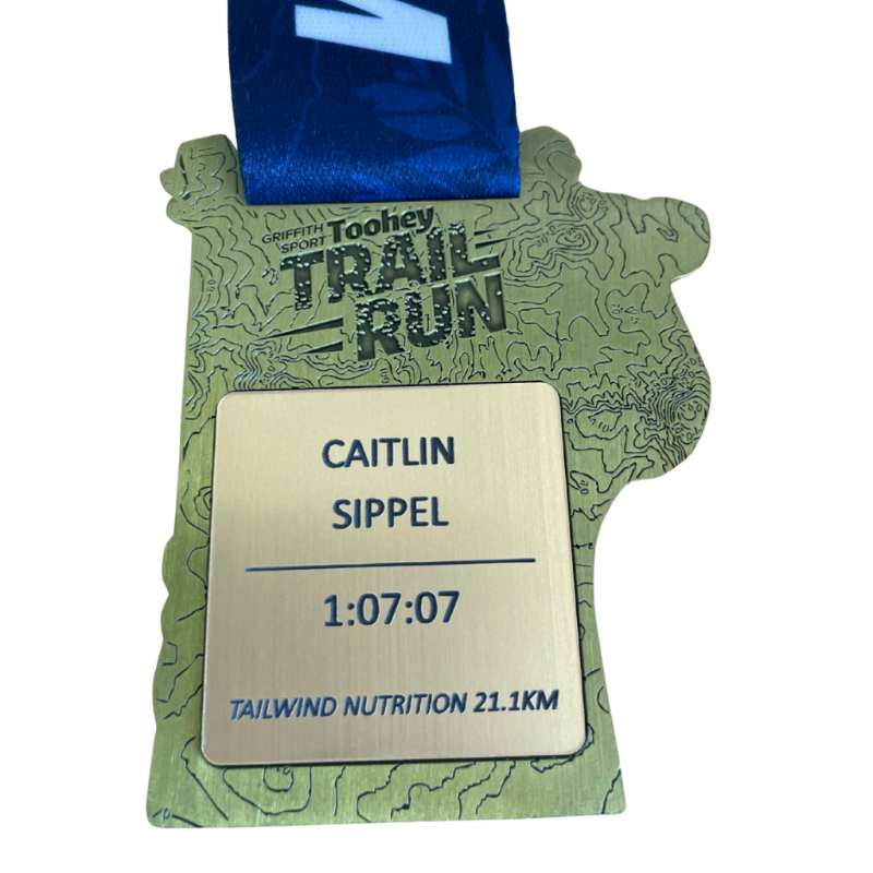 Example of medal tab insert on back of finisher's medal