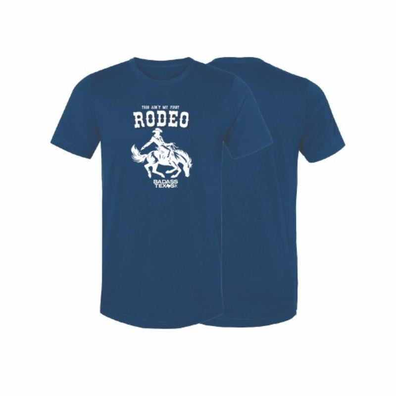 This classic rodeo style meets everyday comfort. Tee features a striking bronco rider graphic printed on a rich blue tri-blend shirt. The bold white artwork gives it a timeless western look that stands out without trying too hard.  Built from a soft tri-b